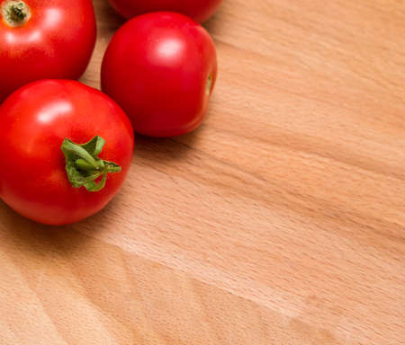 Ripe red tomatoes backgroundの写真素材