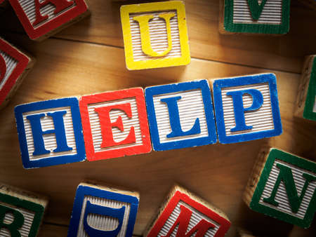 Help word on wooden blocksの写真素材