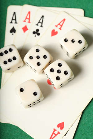 Four aces and four dice portraitの写真素材