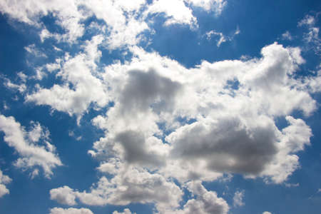 White Puffy Clouds against a Blue Sky