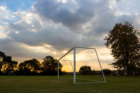 Empty Football Goals in Africa at Sunset