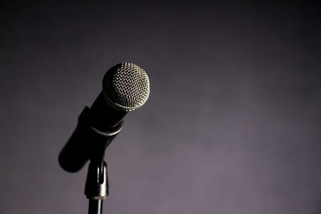 Generic Vocal Microphone on a Dark Background