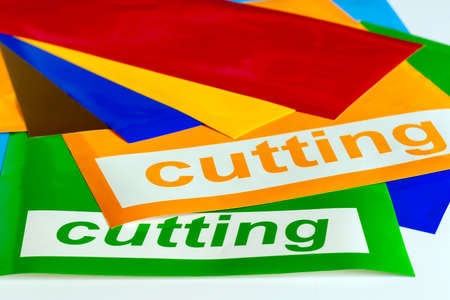 Pieces of colored vinyl film with the inscription "cutting".の写真素材