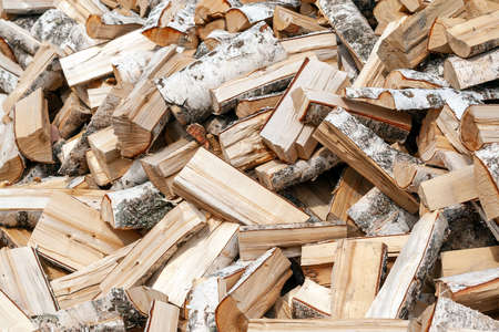 Heap of birch firewood. Background.