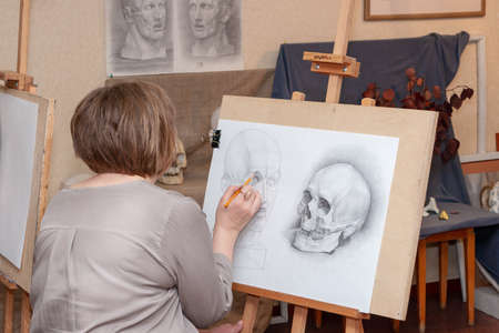 Russia, Surgut, October 17, 2018: Art Studio for adults named after V.Gorda. An adult female student...