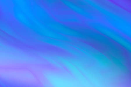 Abstract colored background in blue tones. Background of wavy blue stripes.