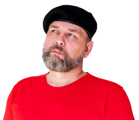 The man looked up thoughtfully. A middle-aged man with a gray beard in a red t-shirt and black...