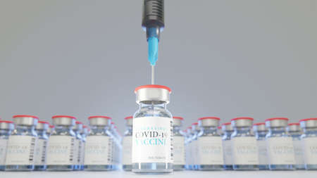 Close-up of a syringe inserted into a vaccine vial against Coronavirus covid-19 against the background of multiple vaccine vials an immunization concept to reduce the spread of pathogens. 3d renderingの写真素材