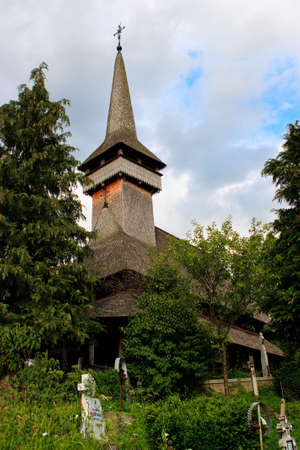 The wooden church in Poienile Izei village, Maramures county, Romania - a UNESCO world heritageの写真素材