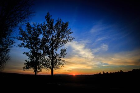 Beautiful sunset in nature. Colorful sky as the sun is setting at the horizonの写真素材