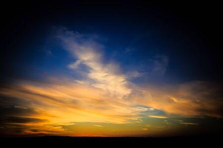 Beautiful sunset in nature. Colorful sky as the sun is setting at the horizonの写真素材