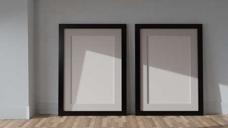 Two posters mockup on a white wall with a black frame. CGI image, 3D rendering, 3D illustrationの写真素材