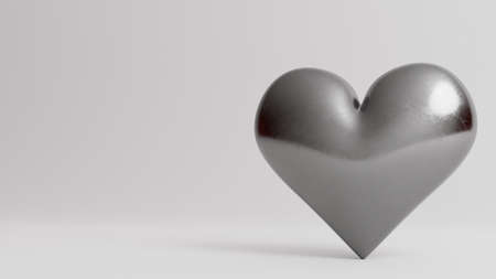 Valentine's Day 3d illustration - rendering. Single silver heart isolated on white background. Layout with negative space for copyの写真素材