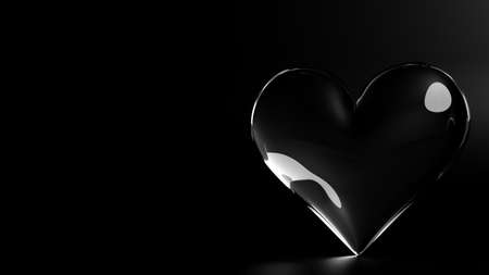 Valentine's Day 3d illustration - rendering. SIngle transparent heart made of glass  isolated on black  background. Layout with negative space for copyの写真素材