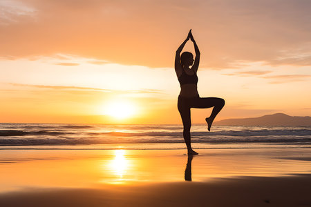 Woman doing yoga on a serene beach at sunset, peaceful and balanced. Generative AIの素材