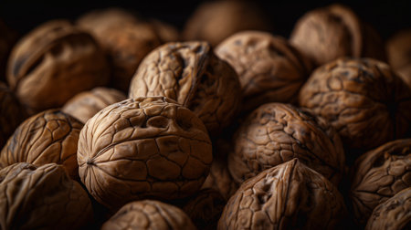 Close up of walnuts on a dark background. Selective focus.の素材