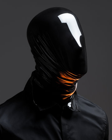 man in a black balaclava with a hood on his headの素材