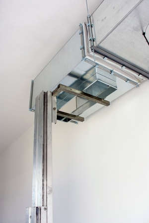 lifting heavy ventilation ducts and preparing for installation