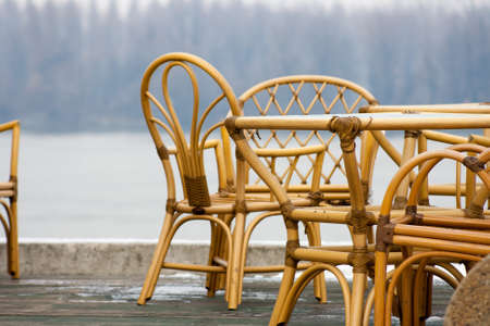 empty restaurant terrace on the river in winterの写真素材