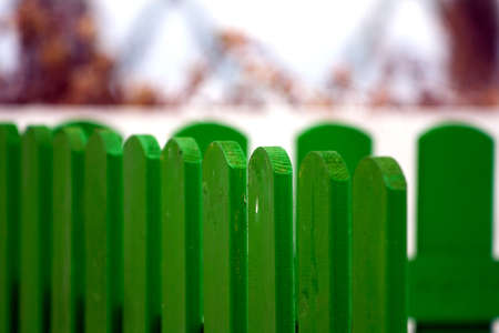 Part of an  green hardwood fenceの写真素材