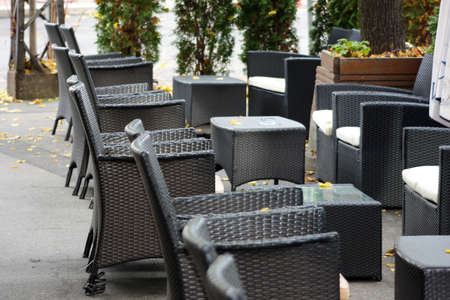 empty restaurant terrace on city streetの写真素材