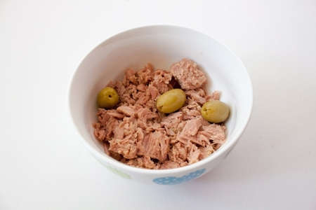Tuna with olives in a bowlの写真素材