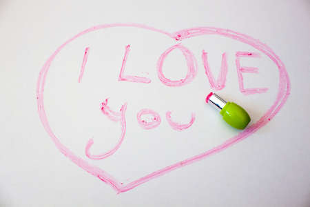 I love you written in lipstick on a white backgroundの写真素材