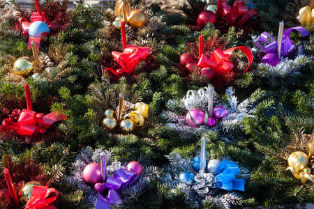 Christmas decorations with candles on the marketの写真素材