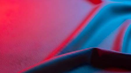 close up of blue and red satin fabric texture background with copy spaceの素材