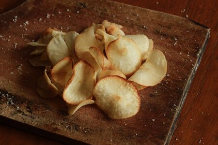 Crispy tapioca chips on the tableの写真素材