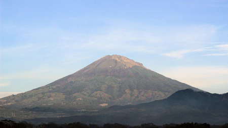 The peak of the mountain is visible in the morning when the weather at the top is sunny. A beautiful view away from the hustle and bustle of the cityの写真素材