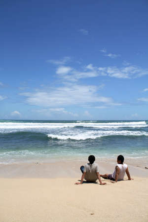 As long as the eye sees in front of the sea. We are only tiny bits in this world. Nature is what we stand onの写真素材