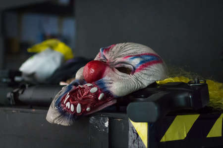Clown mask and rifle used in bank robbery (backstage of commercial advertising)の写真素材
