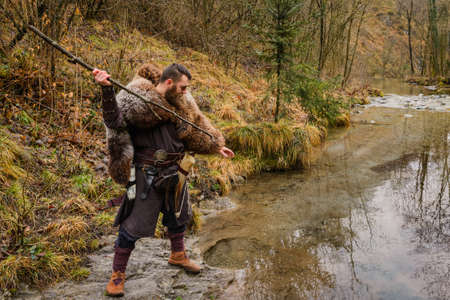 Viking fisherman on the riverの写真素材