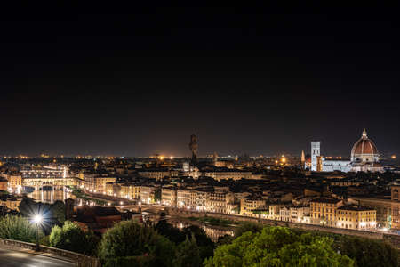 Night view of Florence. Ponte Vecchio, Arno river, Cathedral of Santa Maria del Fiore and church of Santa Croce. Horizontal imageの写真素材