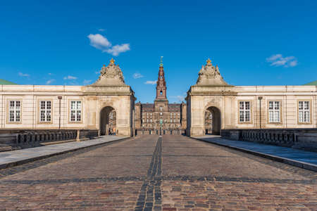 Entrance of Christiansborg Palace in Copenhagen, Denmark. Great building of the Danish Royals under a blue sky on a sunny dayのeditorial素材