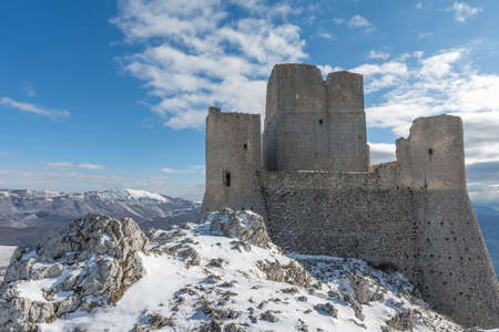 Ancient fortress in the Abruzzesi mountains, snowy mountain landscape of Campo Imperatore - Piana dei Novelli, Italyのeditorial素材