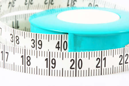 Measure tape coloured in white and blue, isolated on whiteの写真素材