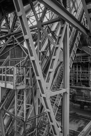 A steel skeleton of an old winding tower on a former colliery siteの写真素材