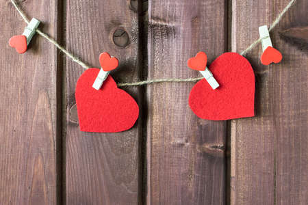 Hearts hanging on the cord toned selective focusの写真素材