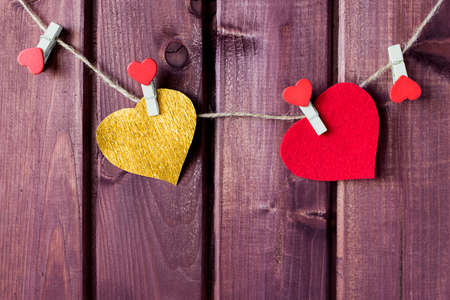 Hearts hanging on the cord toned selective focusの写真素材