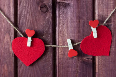 Hearts hanging on the cord toned selective focusの写真素材