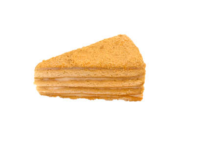 Honey cake with cream side view isolated toned