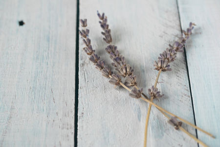 Lavender in white rustic wooden desk. Toned photo. Space for text.の写真素材
