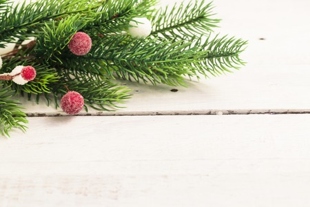 Christmas fir branches with different decoration - citrus slices, sparkling balls and pine cones. Winter holidays.の写真素材
