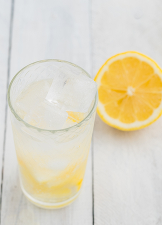 Lemon juice detox water. Mineral water infused with lemons.の写真素材