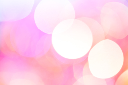 Light orange bokeh lights abstract background. Blurred lights.の写真素材