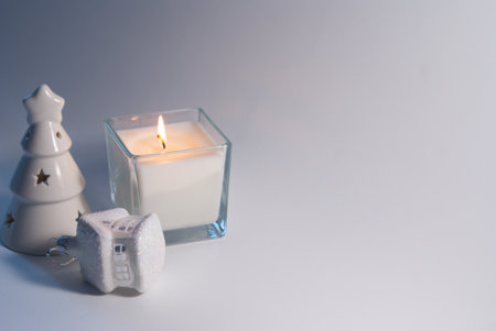 Christmas tree, candle, Christmas tree decoration on white background. Empty space for text.の写真素材