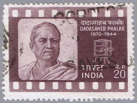 INDIA - CIRCA 1971: A stamp printed in India shows a portrait of the Indian motion picture pioneer Dadasaheb Phalke, circa 1971の写真素材