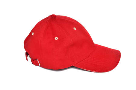 Red baseball cap on a white backgroundの写真素材